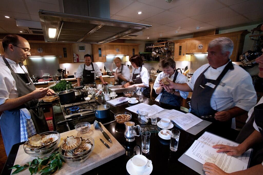 Chefs stood around a table