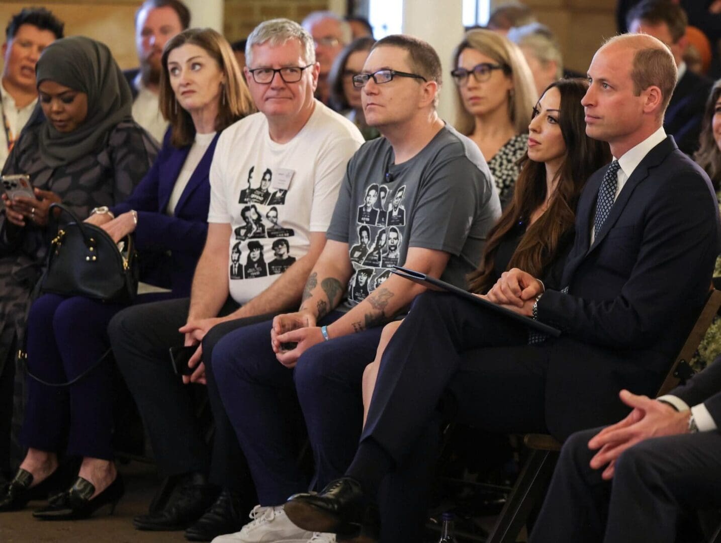 Chris Lynam Chris Lynam sitting next to Prince William