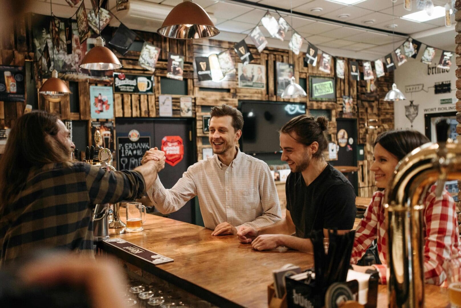 pexels-pavel-danilyuk-5858215 (1) Friends meeting in a pub.