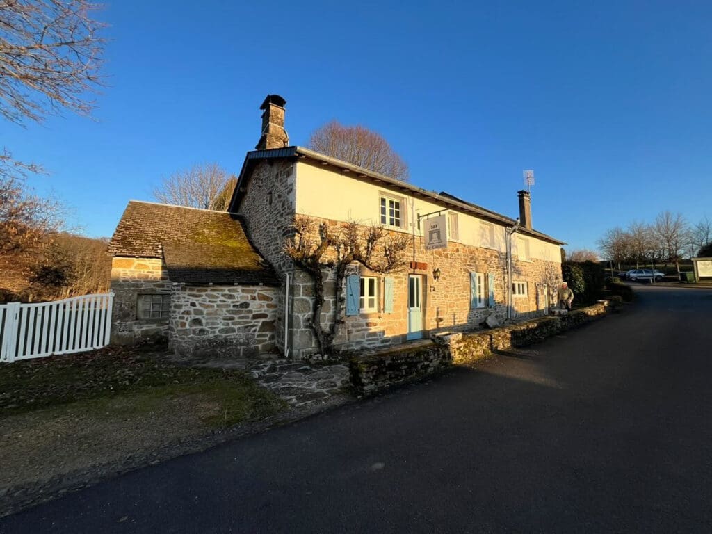  Le Cantou B&B pictured on a sunny day in France, with blue skies.