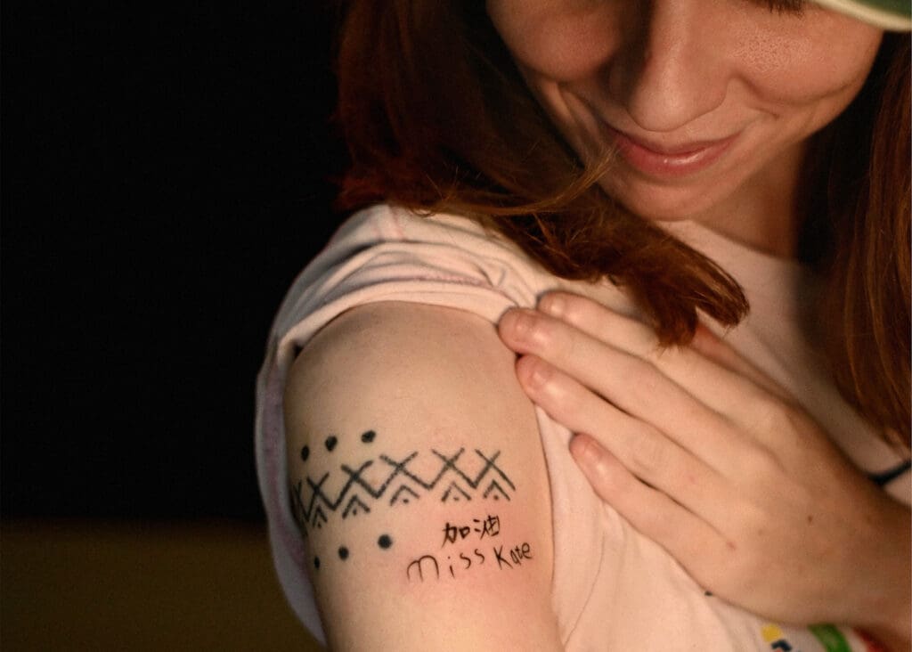 Tattoos on Kate's arm.