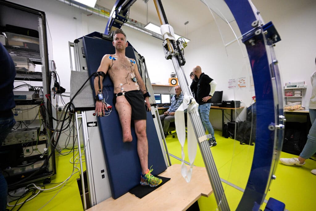John McFall in a tilt-table machine for investigation and tests.